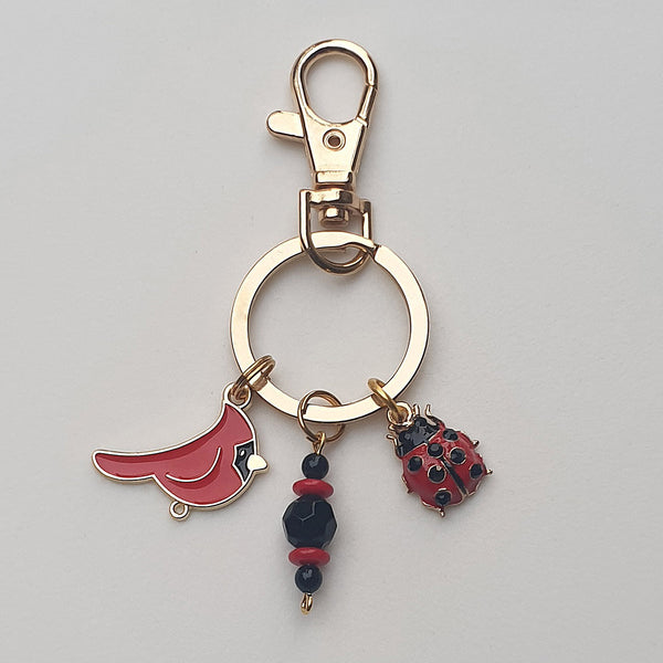 Goldtone Red and Black KEYCHAIN