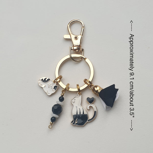 Goldtone Black and White KEYCHAIN